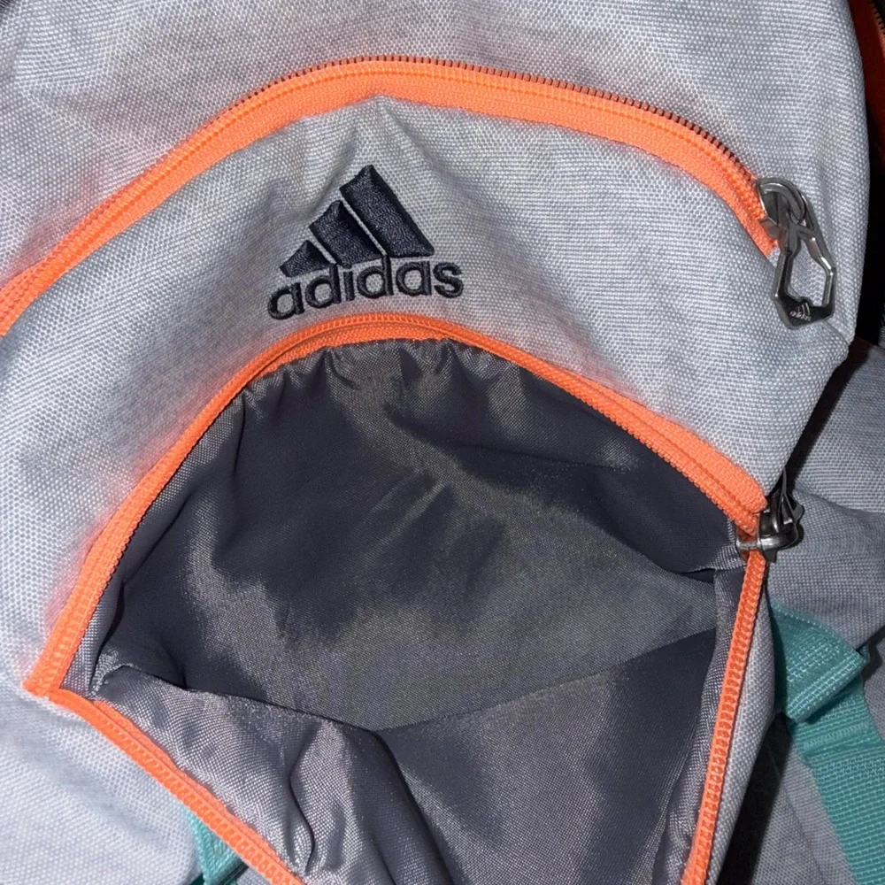 adidas Light Gray Backpack with Teal Accents and Orange Zippers - Picture 6 of 7